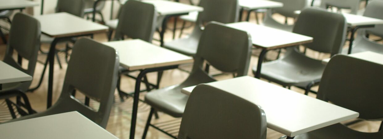 Rows of desks in classroom